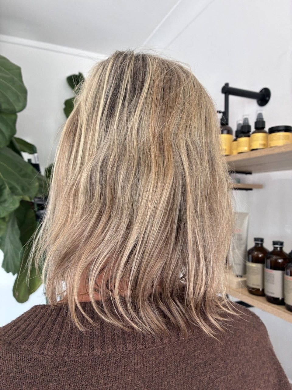 Before hair transformation showing longer blonde hair