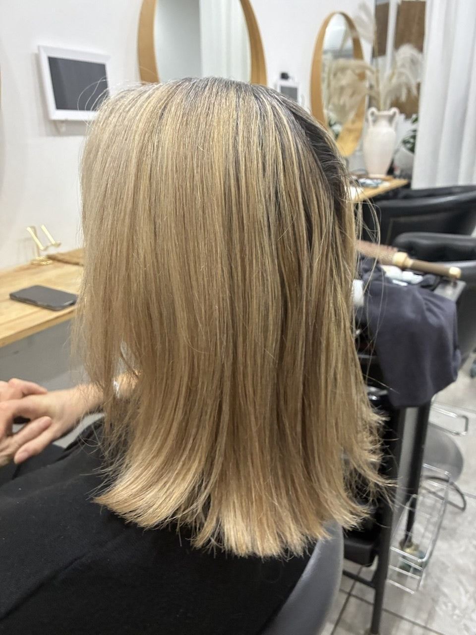 Before hair transformation showing longer blonde hair
